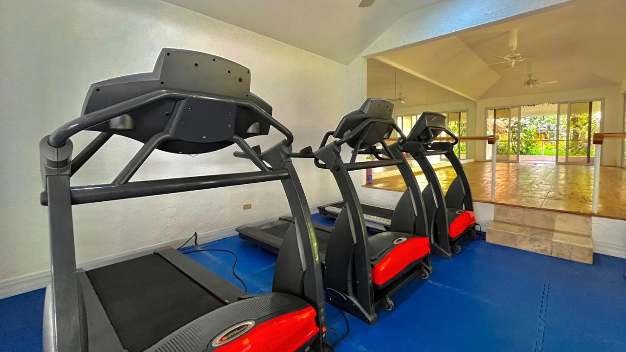 Coco Grove Beach Resort, Siquijor Island Esterno foto Treadmills at the gym
